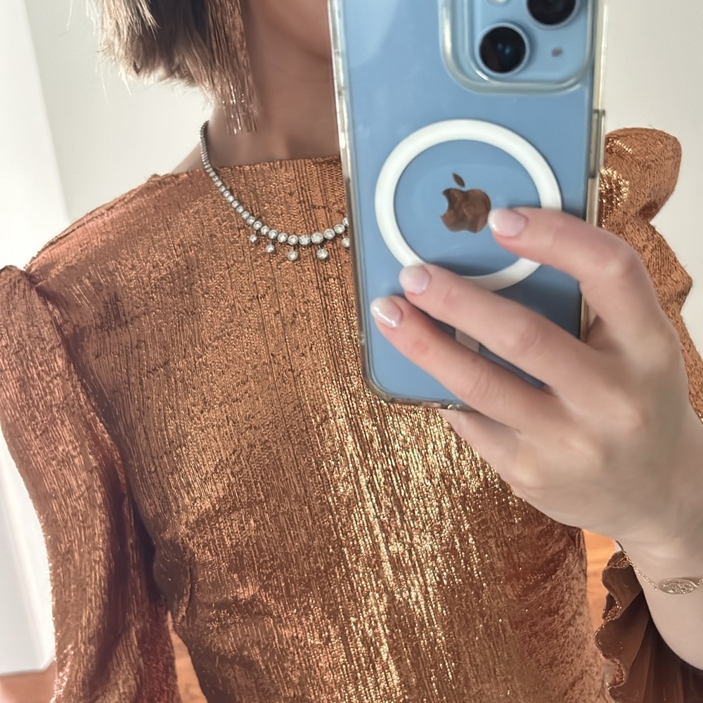 Vampires wife rose gold lame gown